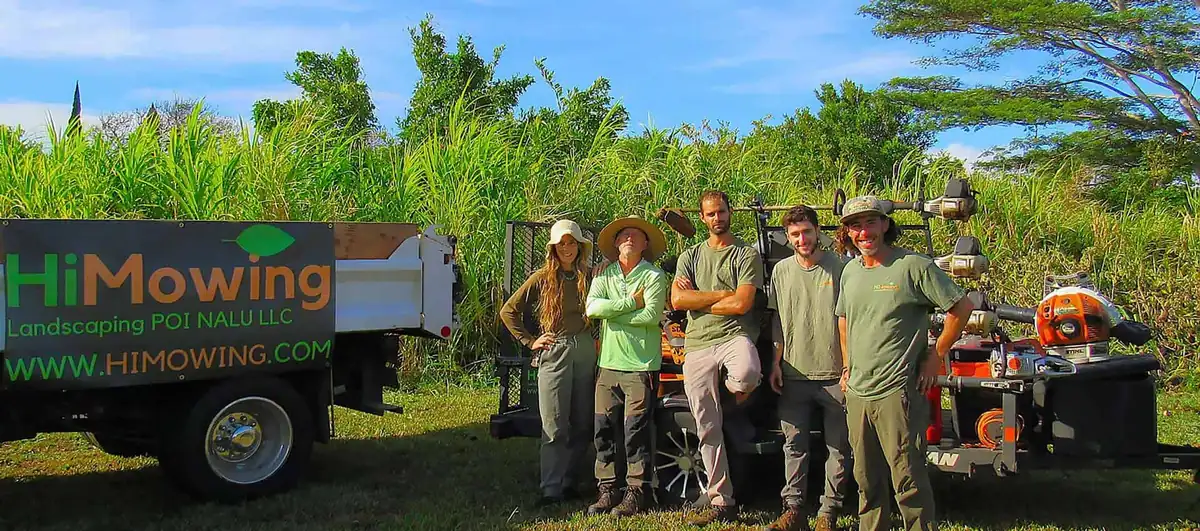 The HiMowing crew with their trucks and equipment on Maui