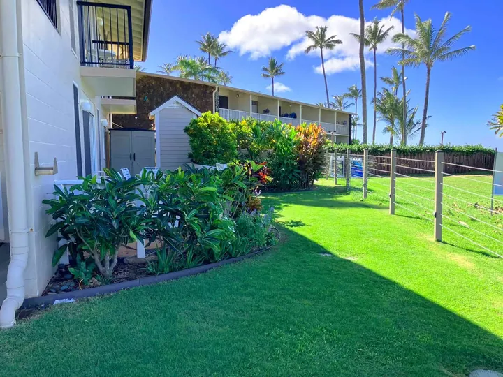 Resort-style garden and lawn at a Maui condo property